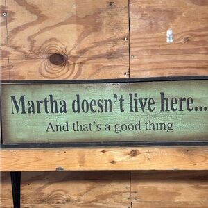 Green and Black Wall Sign - Martha Doesn't Live Here